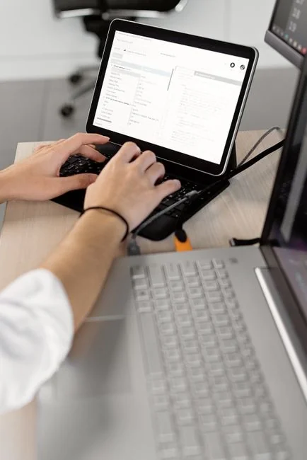 A laptop screen showing ChatGPT’s welcome page on the OpenAI website.